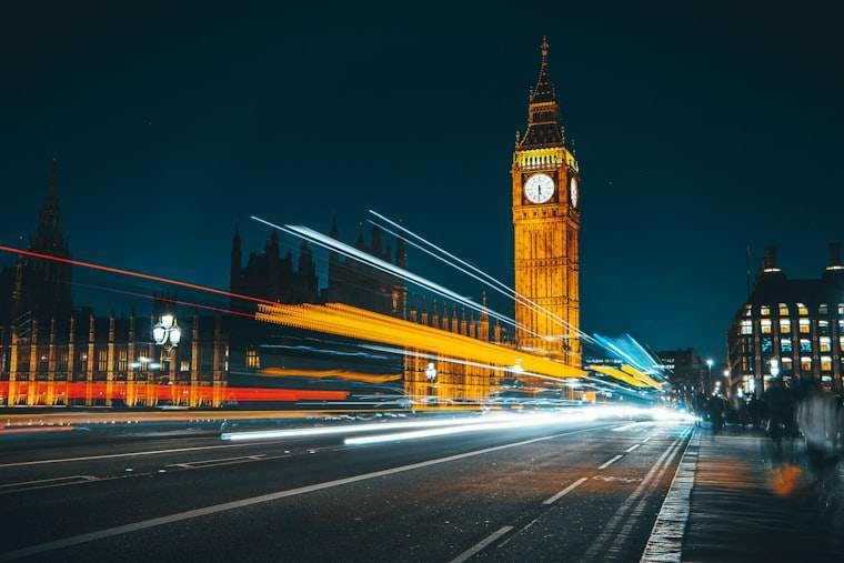 Traffic moving through a city at night